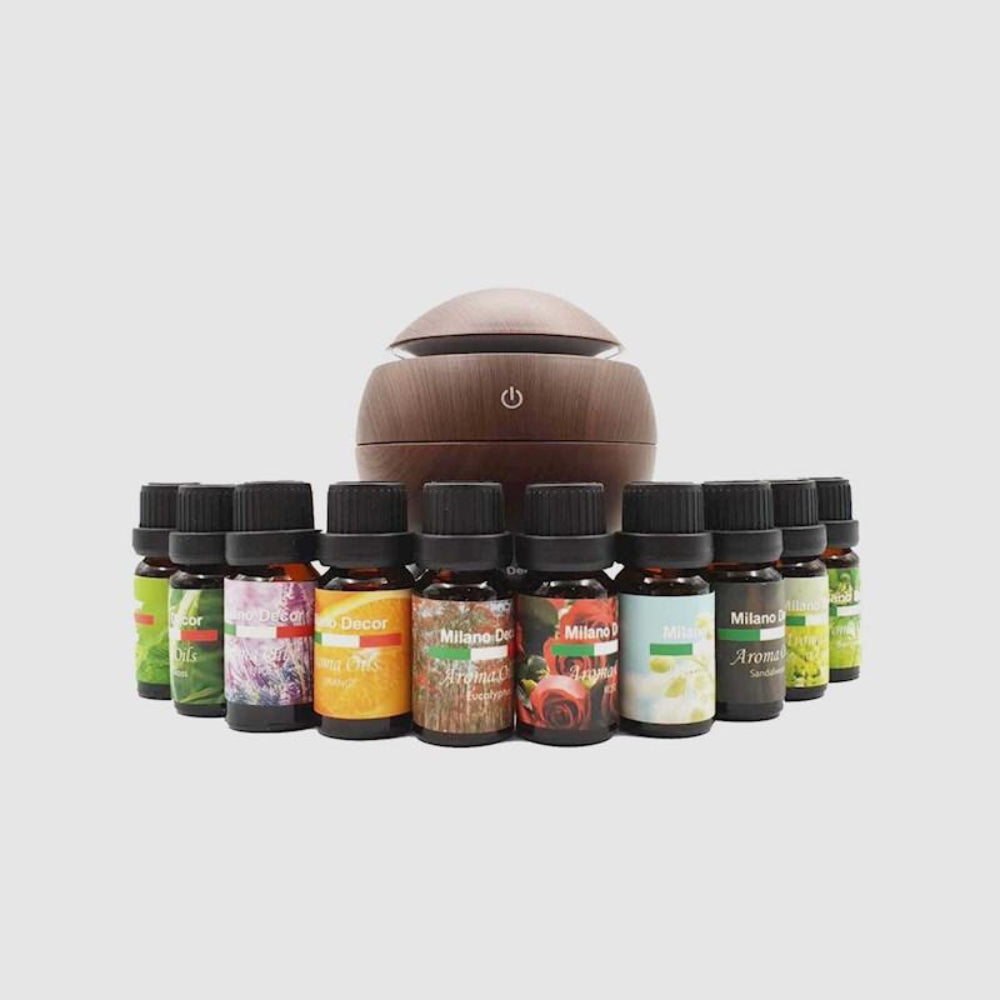 Collection of 10 Milano Decor essential oils including Lavender, Eucalyptus, and Tea Tree, each 10ml with premium amber glass bottles